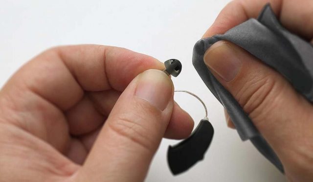 Cleaning hearing aids